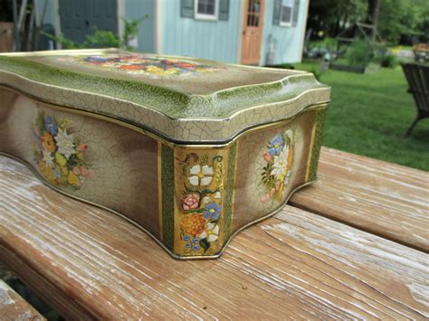 blue metal rectangle box collectible|Vintage embossed metal box / blue flower hinged lid / Marked .